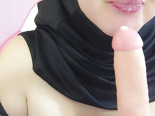 My stepsister in a hijab undresses my brother-in-law on camera