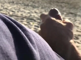 My adorable wife with ABS sucks my dick hard on a beach