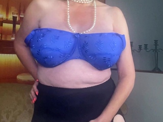 Busty mature babe riding a big dildo