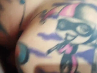 Tattooed milf enjoys jumping on a young cock