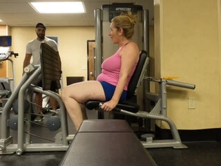 Blonde milf does some cardio training with her trainer